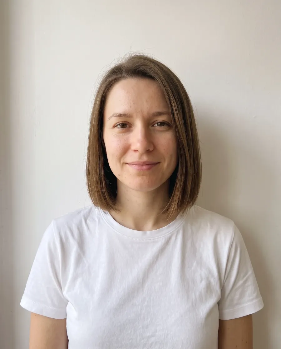 The same woman with a sleek chin-length bob