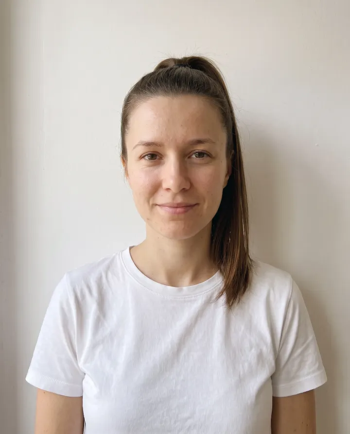 The woman with a sleek high ponytail
