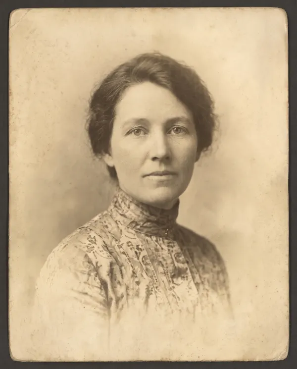 The same portrait with the missing half of the face filled in by AI